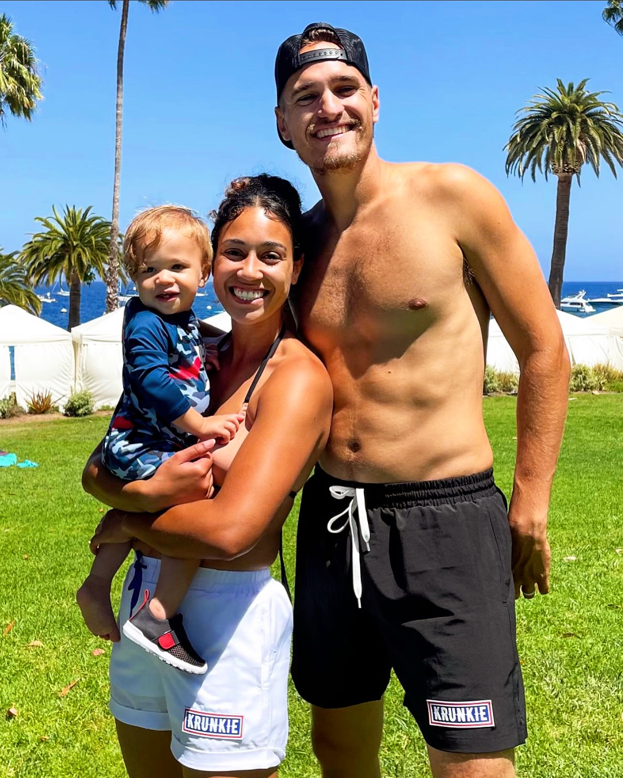 Family in Krunkie shorts on the coast