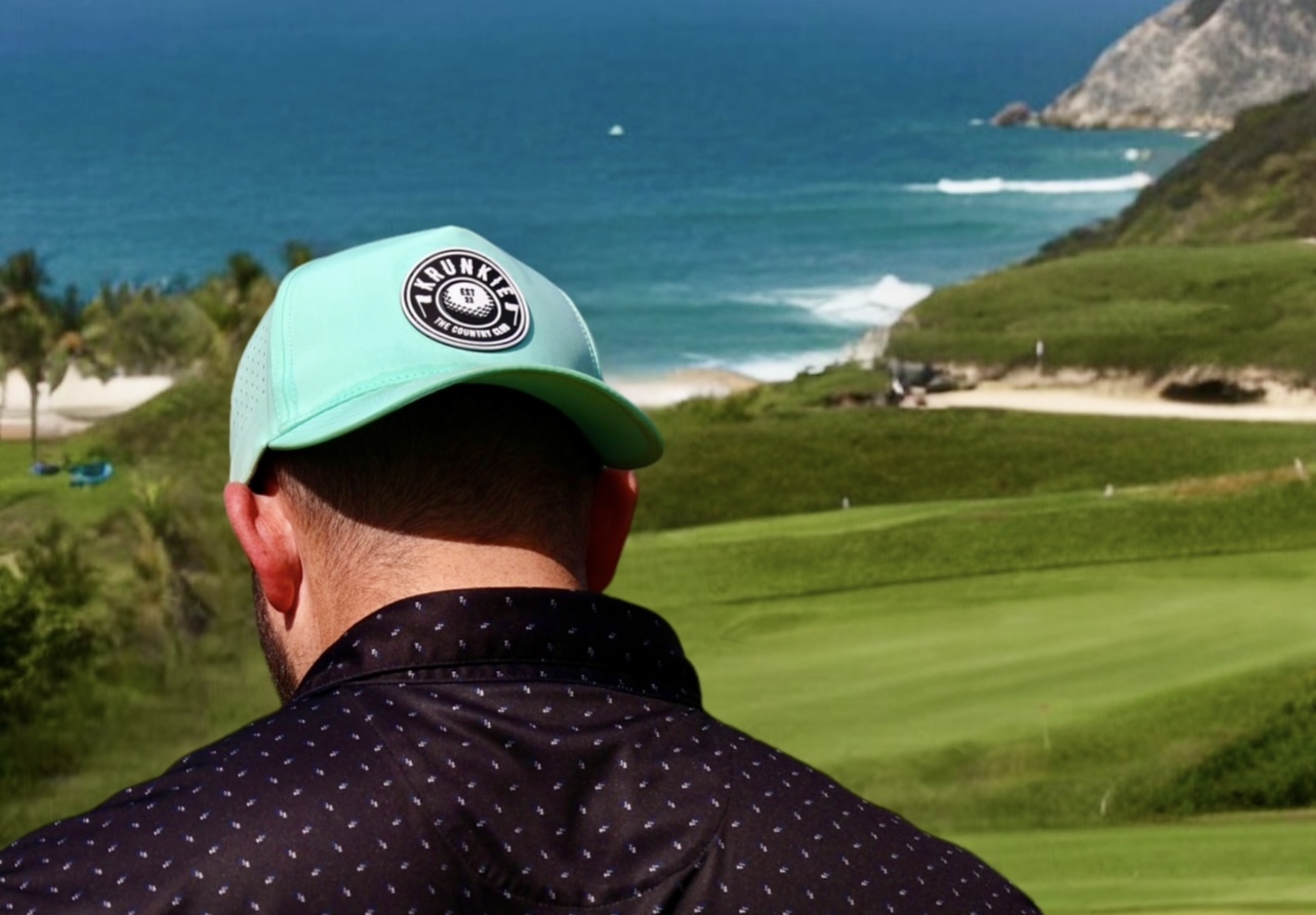 Krunkie country club hat on the green