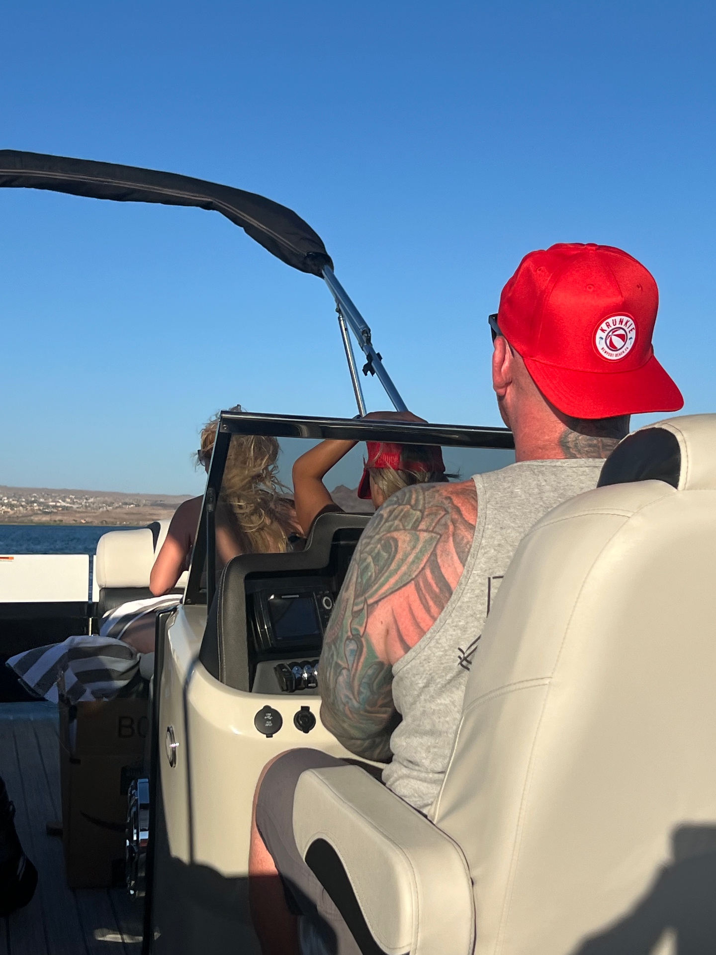 Krunkie red snapback on the boat